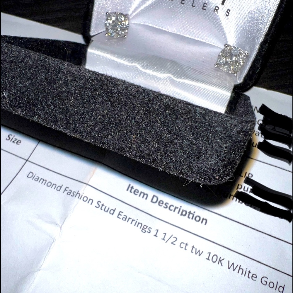 Diamond 1 1/2 carat earrings 10k white Gold Only worn to try on.